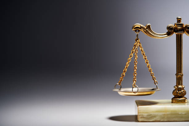 istock close up of libra scale against gray background 1435602733