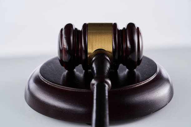 istock gavel hammer against gray background 1435602822