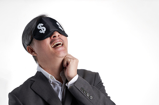 businessman with dollar sign eye mask against white background