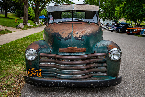 Des Moines, IA - July 01, 2022: High perspective front view of an old 1951 Chevrolet Advance Design 3100 Pickup Truck at a local car show.