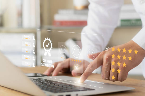 istock User give rating to service experience on online application, Customer review satisfaction feedback survey concept, Customer can evaluate quality of service leading to reputation ranking of business. 1435606164