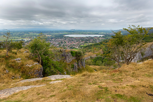 Elevated view of Cheddar Reservoir and Village from the top of the Cheddar Gorge in Somerset, England