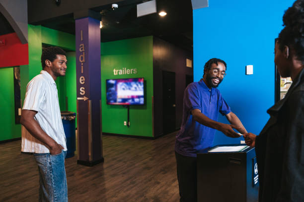 istock People entering the cinema 1435610487