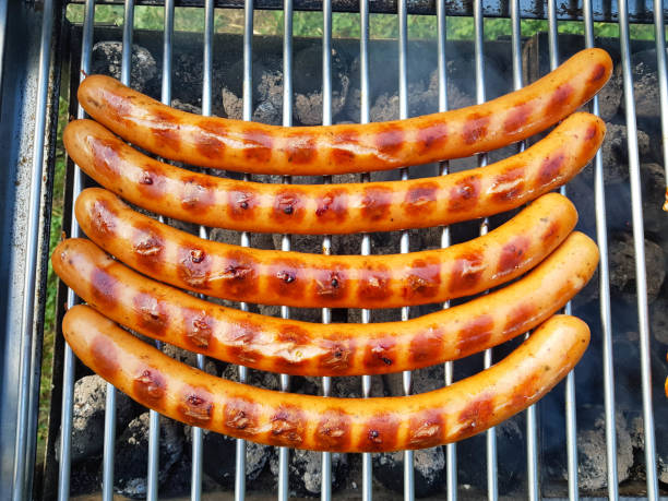 grigliate - spit roasted barbecue grill barbecue pork foto e immagini stock