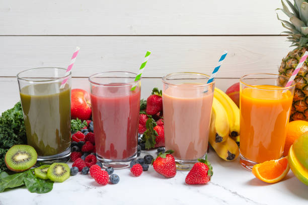 istock Four different healthy smoothie flavors in glasses with straw 1435612055