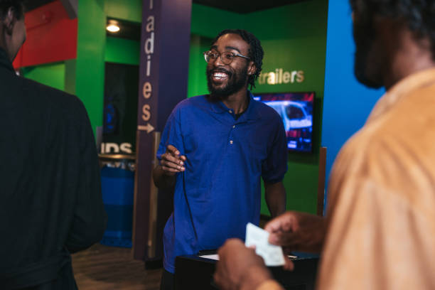 istock People entering the cinema 1435613475