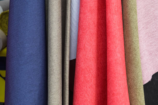 istock Samples of cloth and fabrics in different colors found at a fabrics market 1435617632