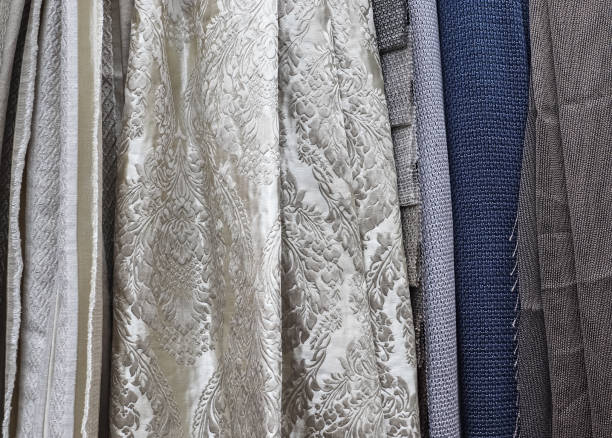 istock Samples of cloth and fabrics in different colors found at a fabrics market 1435618077