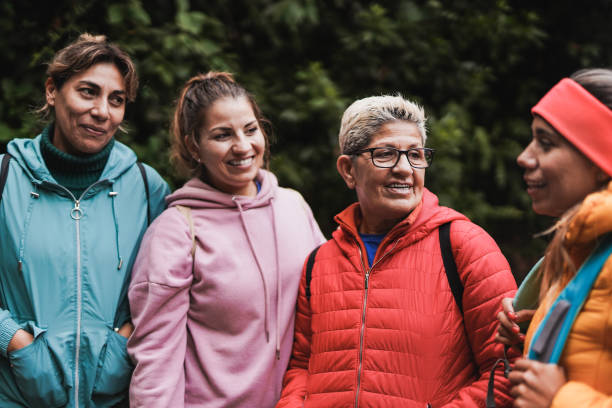 istock Multi generational women having fun together during hiking day at mountain forest 1435623335