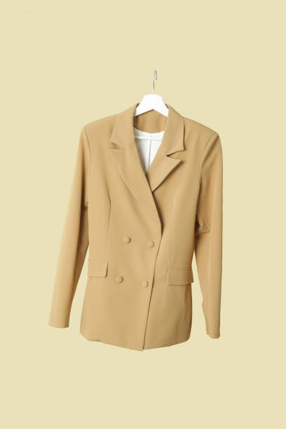 istock Studio shot of floating double breasted blazer on coat hanger 1435631715