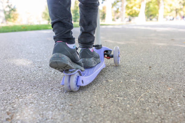 istock A girl with a scooter 1435635265