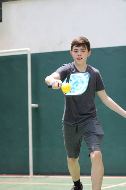 istock teenager playing pickleball 1435636219