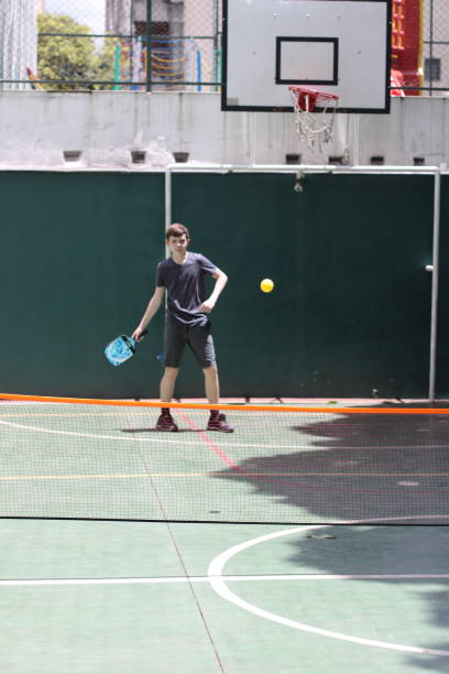 istock teenager playing pickleball 1435636238