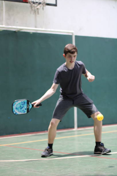 istock teenager playing pickleball 1435636282