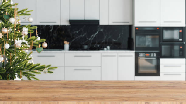 istock Wooden Table In Modern Kitchen With Christmas Decoration 1435642261