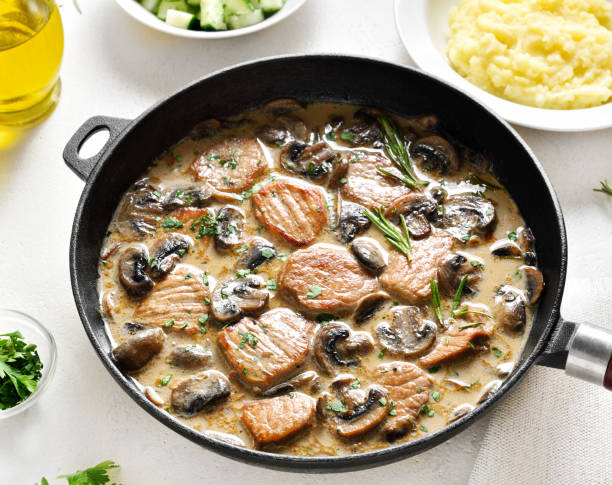 istock Pork medallions with mushroom sauce 1435644145