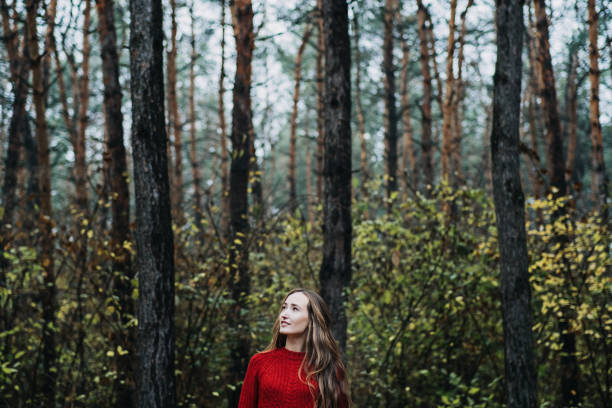 istock Mindfulness-based cognitive therapy, Mindfulness practices. Young woman with long hair relaxing in forest 1435644228