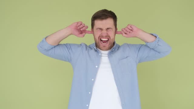 Man showing explosion gesture in brain isolated on background in studio. 4k video