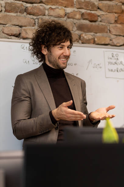 istock Young manager talking in a conference room 1435646753