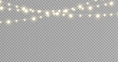 Christmas lights isolated realistic design elements. Glowing lights for Xmas Holiday cards, banners, posters, web design. Stock royalty free vector illustration. PNG