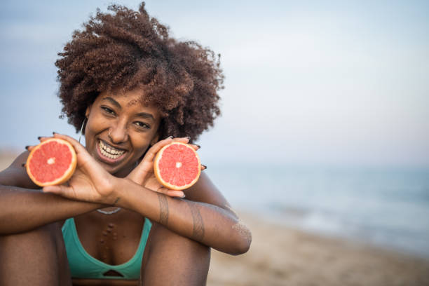 istock Grapefruit refreshes me well on these hot summer days when I spend the day on the beach 1435649424