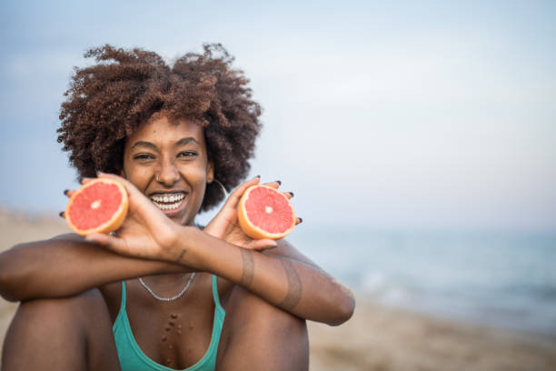 istock Grapefruit refreshes me well on these hot summer days when I spend the day on the beach 1435649445