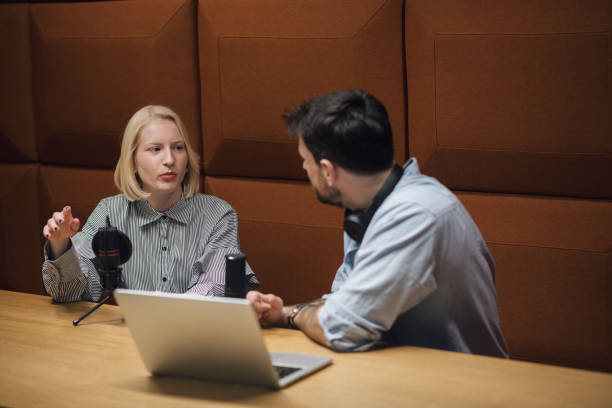 istock Young man interviewing his beautiful young guest 1435651986
