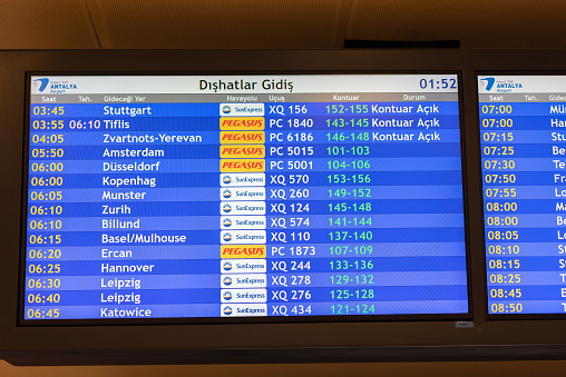 Antalya,Turkey: October 20,2022 LCD television screen at Antalya Airport displays flight departure information.\