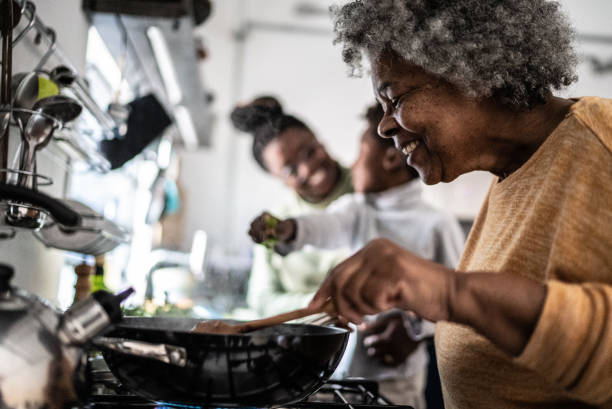 istock Grandmother cooking in the kitchen at home 1435656520
