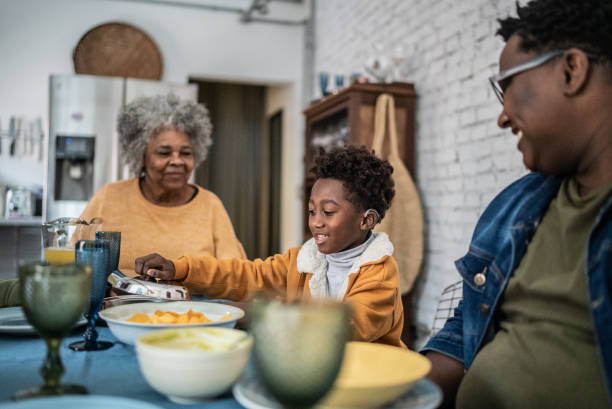 istock Family talking and eating during the lunch at home 1435656607