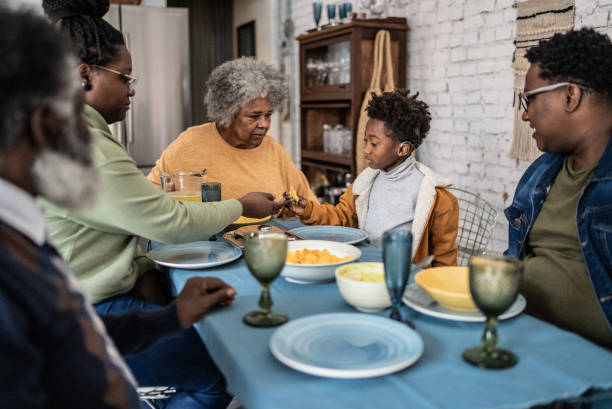 istock Family talking and eating during the lunch at home 1435656621