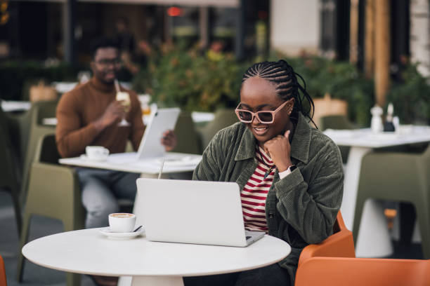 istock Modern young freelancers working from a coffee shop 1435658719