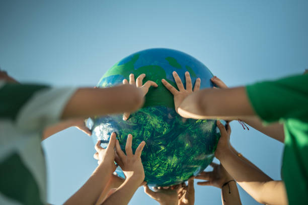 istock Children holding a planet outdoors 1435661954