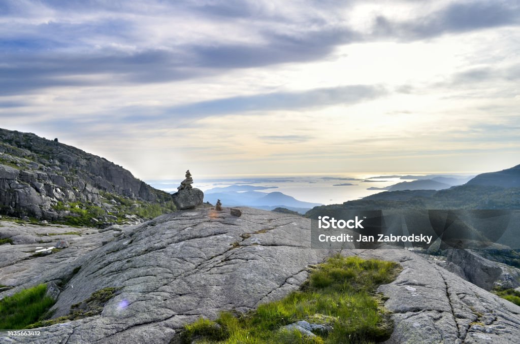 Mountain landscape with rocks, fjord and valley - Preikestolen, Norway Rocky landscape with sea and deep fjord valley - Preikestolen, Norway Adventure Stock Photo
