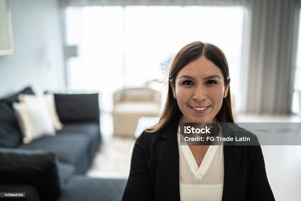 Portrait of businesswoman in the living room at home Businesswoman Stock Photo