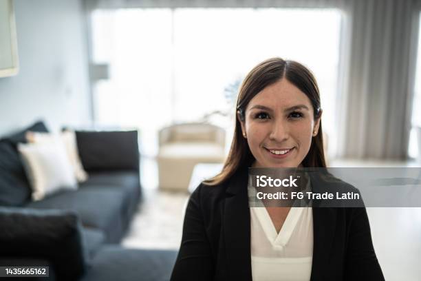 Portrait Of Businesswoman In The Living Room At Home Stock Photo - Download Image Now