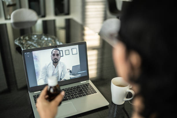 istock Patient on a remote meeting with a doctor at home 1435665752