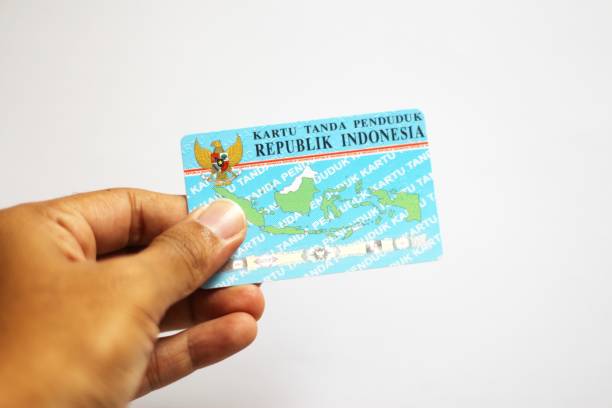 istock People holding indonesian citizenship identity card. 1435679731
