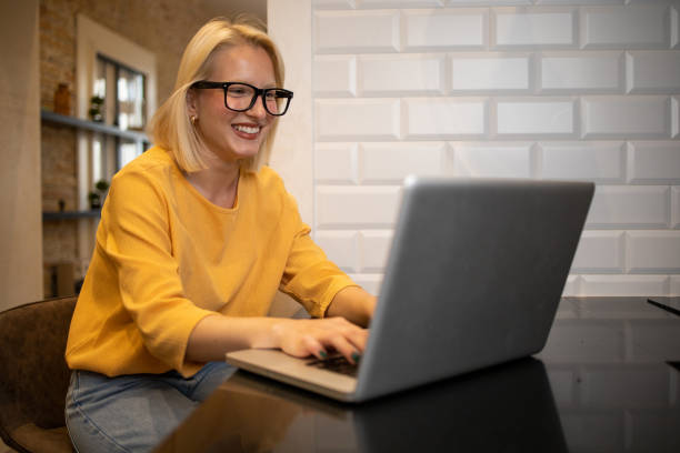 istock Young woman working from home 1435686013
