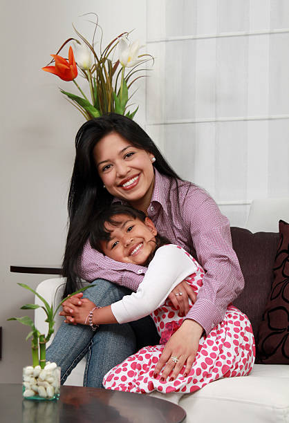 istock Mother and girl smiling 143569985