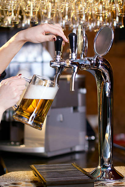 istock waiting woman pouring beer 143570378