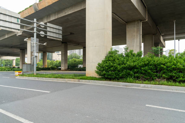 istock Concrete structure and asphalt road space under the overpass in the city 1435706823