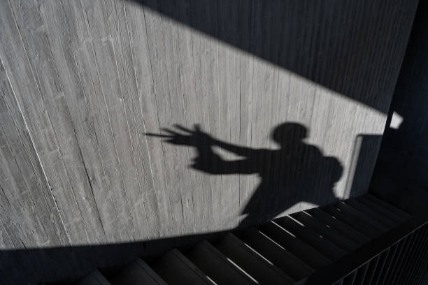 istock The lighting effect of human shadow on the wall 1435710965