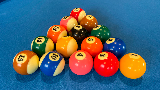 Billiards Balls on light blue table