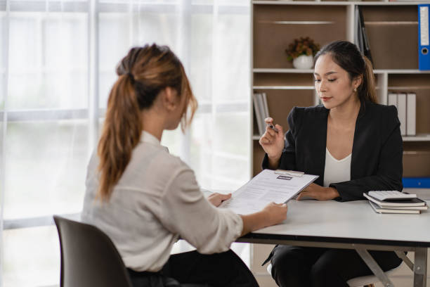 istock office interview interns or interns with applying for an open position Meet with the Human Resources Manager employment concept 1435723461