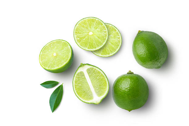 istock Lime fruits with green leaf and cut in half slice isolated on white 1435728169