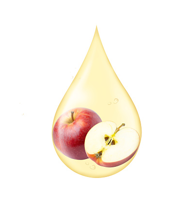 Drop of red apple serum collagen oil isolated on white background. Fruit collagen, natural organic cosmetic ingredient for skin care, beauty and spa concept.