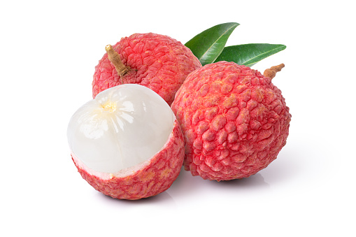 Lychee with leaves on white background