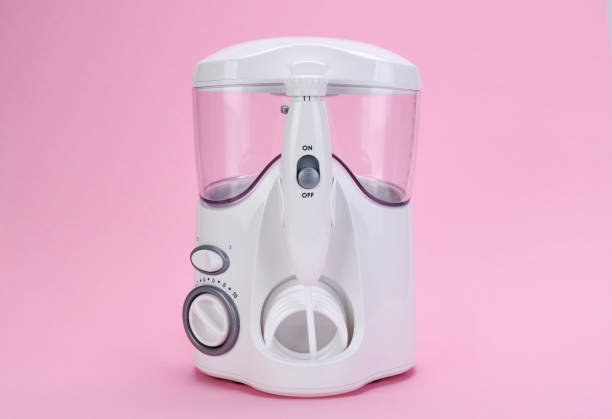 istock Irrigator for cleaning teeth. Oral and dental care. 1435751170