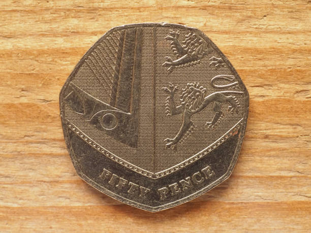 istock 50 pence coin, reverse side, currency of the UK 1435755113